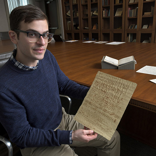 curator sam bessen holding possible EA Poe sheet music