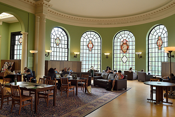 students studying in the Hutzler reading room in gilman hall